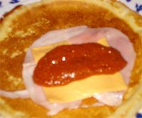receta de San Jacobos de crepes rellenos de salsa boloesa